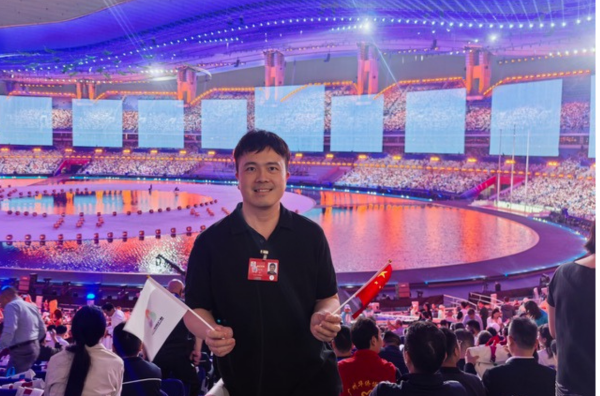 Dr Howard Long at Guangzhou stadium ceremony